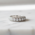 Estate 925 sterling silver 3-carat diamond ring on white marble surface